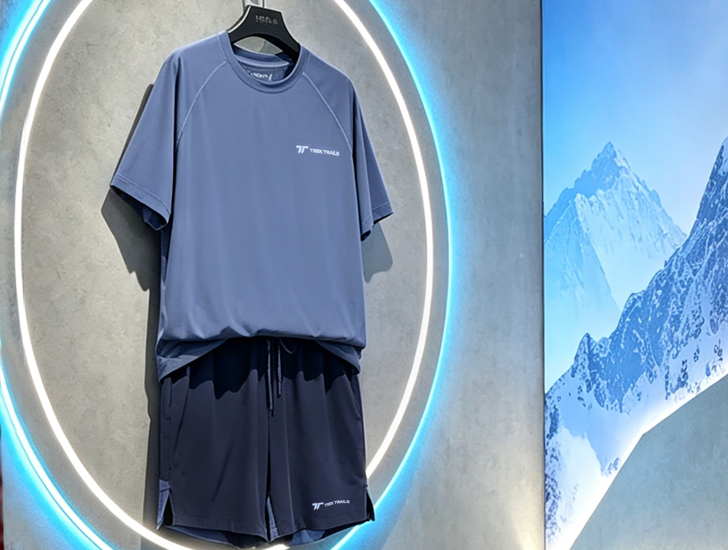 Display image of the custom T‑shirt and shorts set manufactured for TREK TRAILS as part of TAVATINO’s 100‑day OEM apparel project